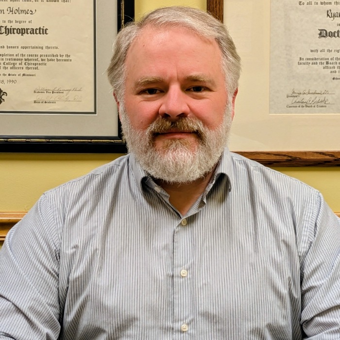 Dr. Ryan Holmes