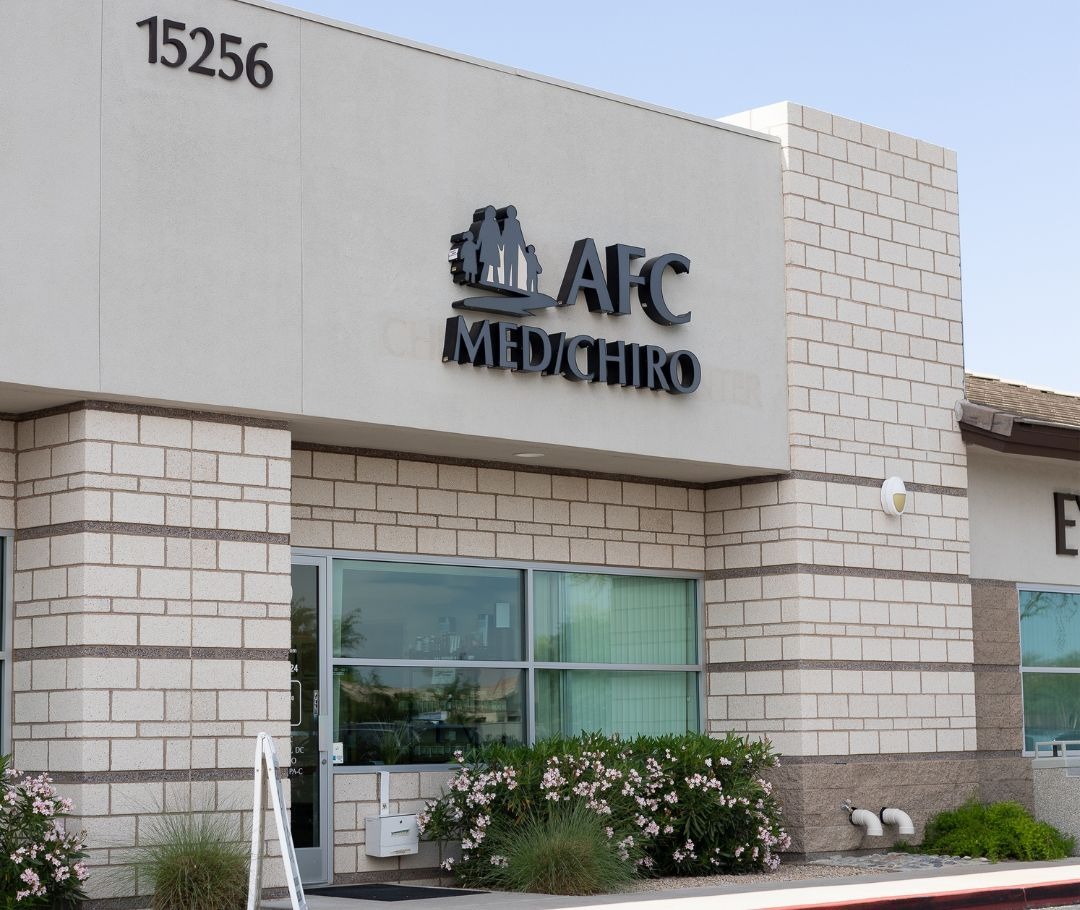 AFC Peoria Clinic building entrance showcasing modern architecture and welcoming atmosphere.