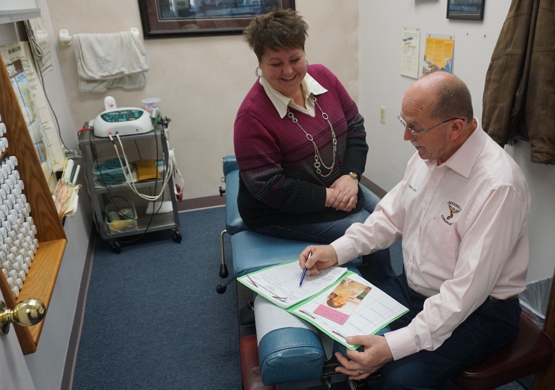 Dr. Wise discussing nutrition with a patient.