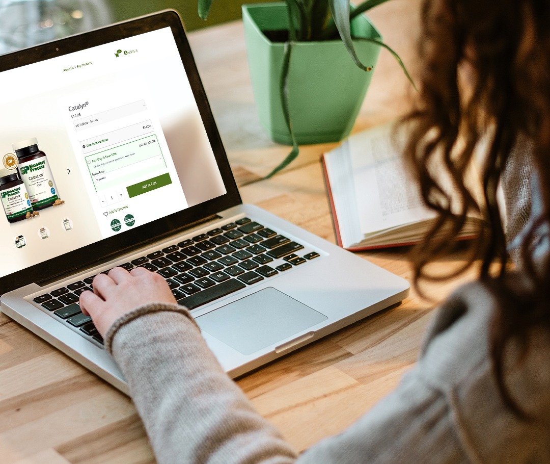 Young woman ordering Standard Process Whole Food Supplements online.